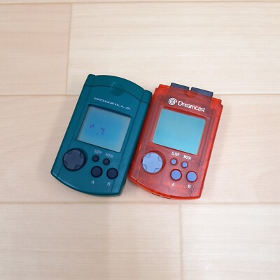 LOT 2 Sega Dreamcast Visual Memory Unit VMU Memory Card Clear Red & Godzilla-image