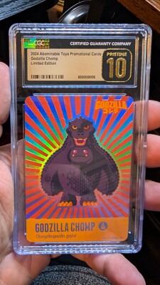 NYCC 2024 CGC Prestine 10 Godzilla Chomp Card Foiled #45 /100 Plastic Empire-image